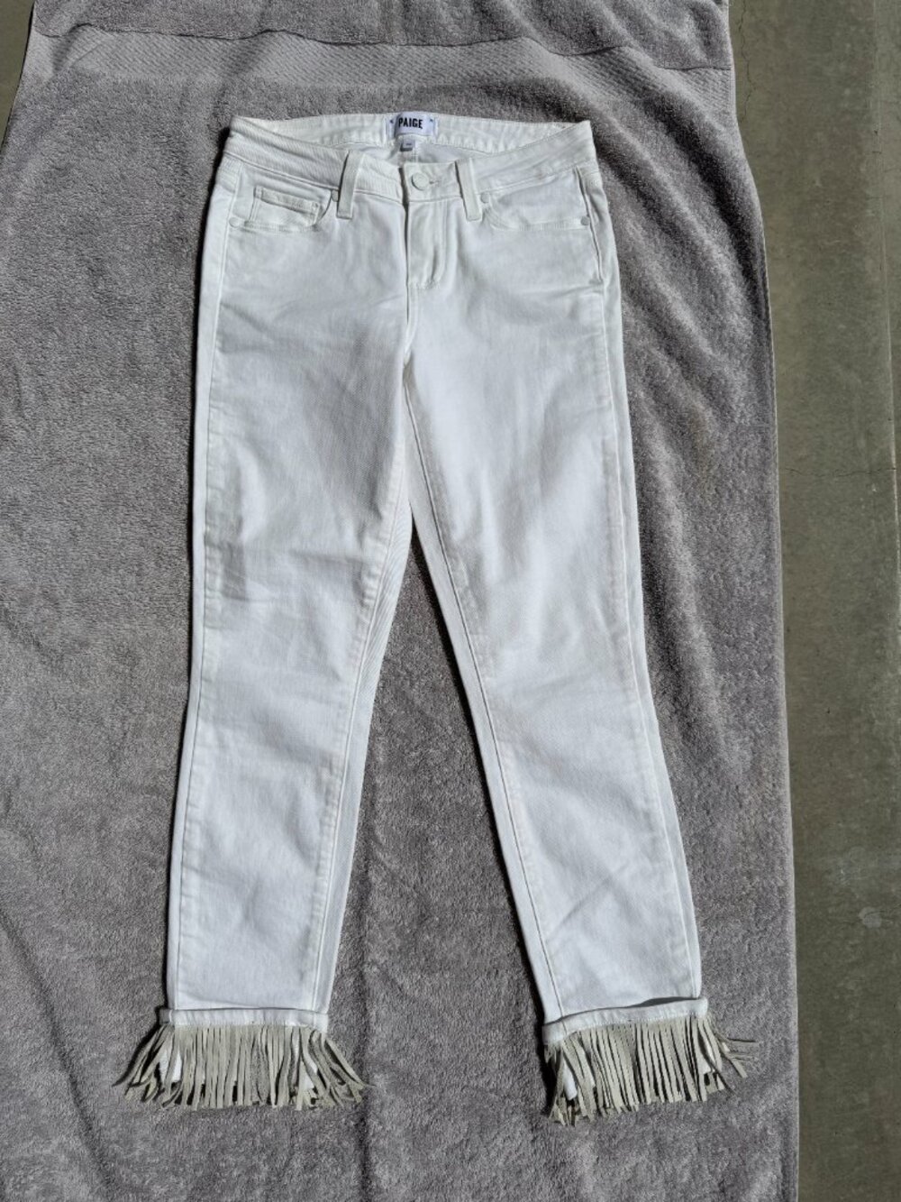 White Paige Verdugo Ankle Jeans with Leather Fringe Trim